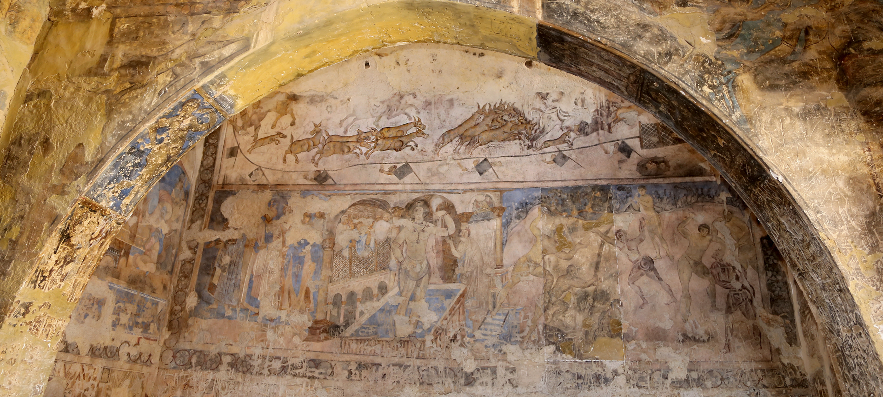 Another faded fresco showing almost the same scene as the first one with various figures engaged in different tasks. The colors are different - primarily shades of brown and blue. The outer border is too faded to make out the pattern.